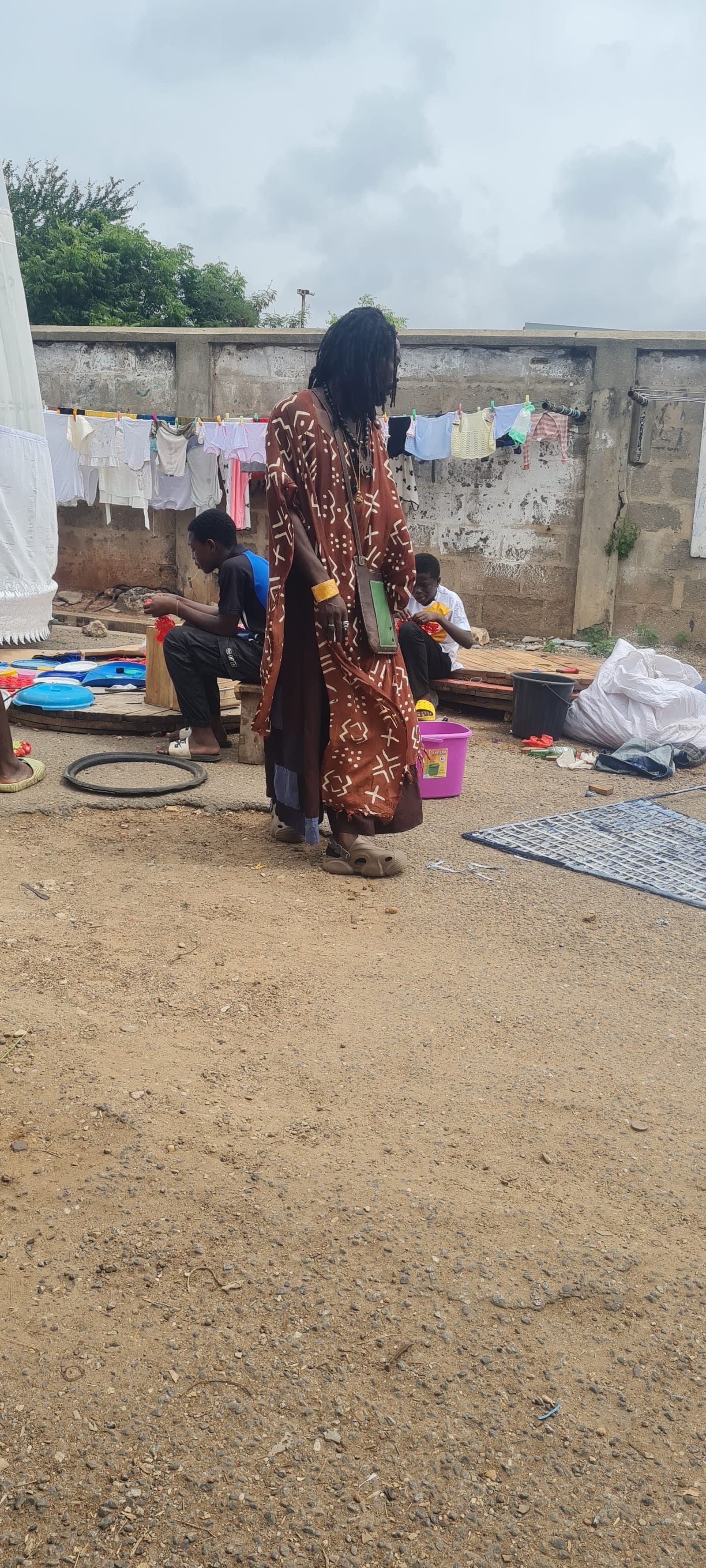 Young makers sorting material on mats
