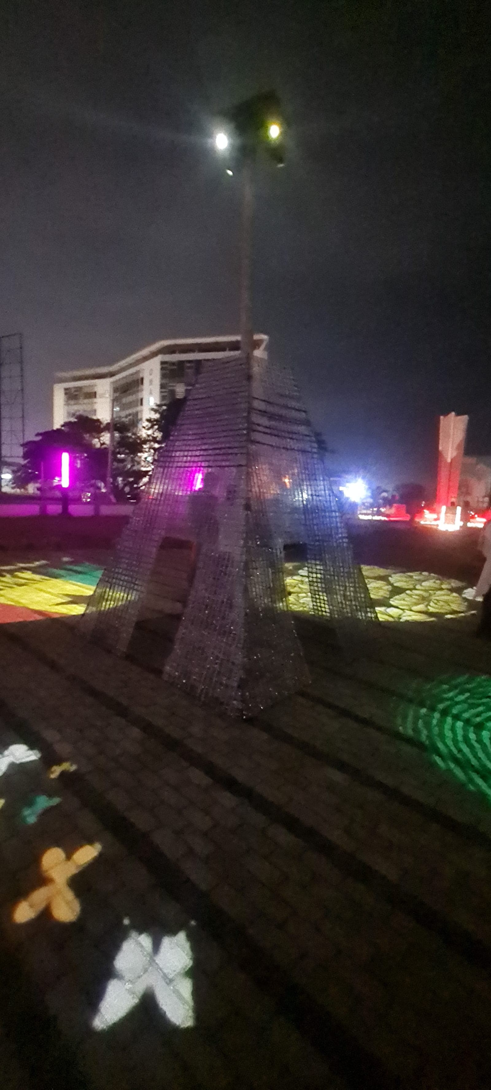 The tower lit from within at night