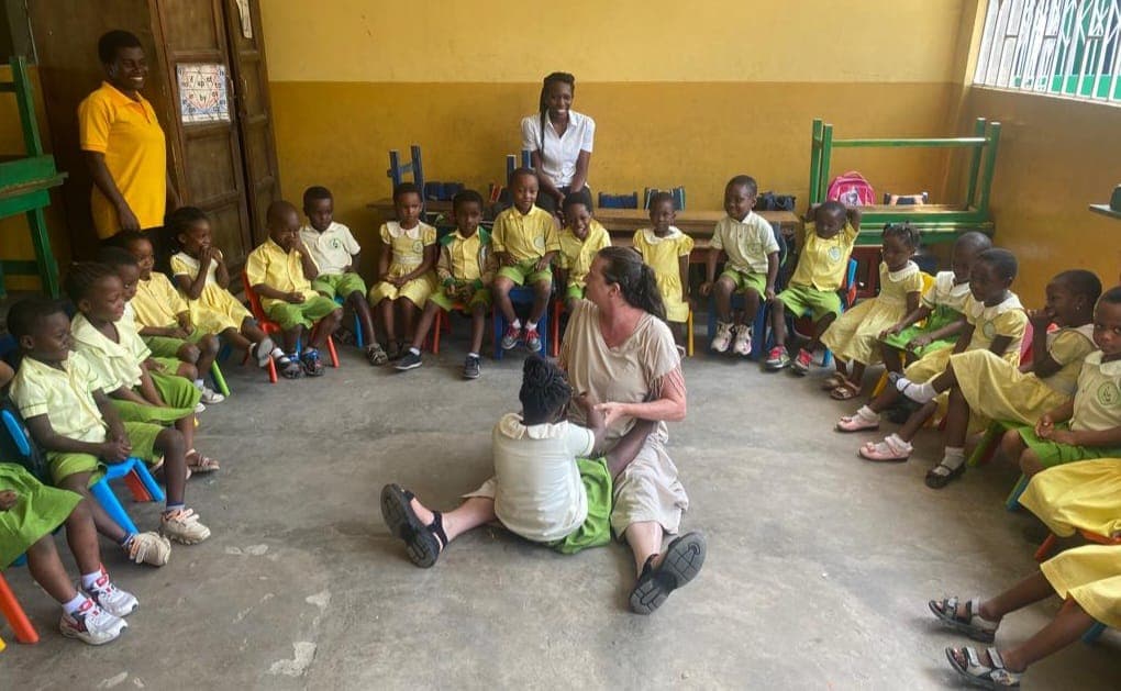 Leading a movement session with a full classroom, Ghana